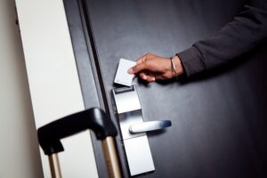 Man unlocking his hotel room